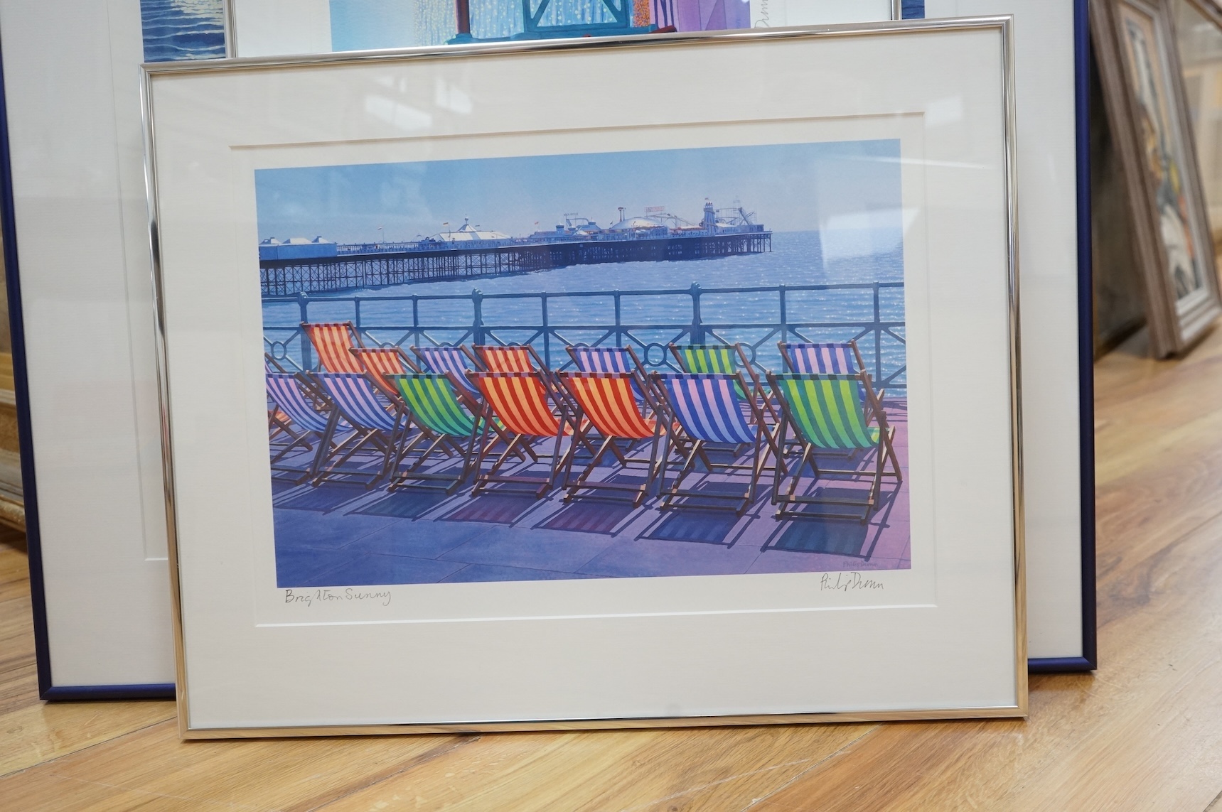 Philip Dunn (b.1945), three giclée prints, comprising 'My latest deck chair', 'Brighton Sunny' and 'One fine day', each signed in pencil, largest 71 x 53cm